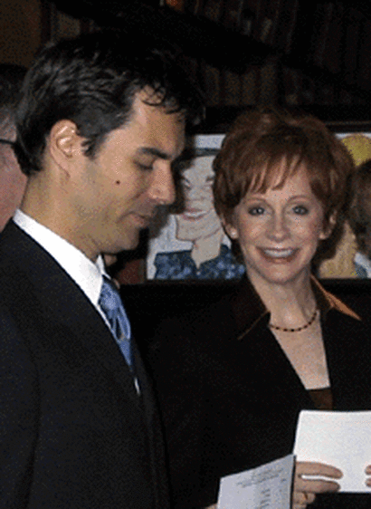 Eric McCormack and Reba McEntire prepare backstage at Sardi's.
