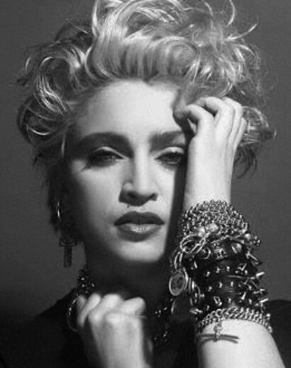 //assets.playbill.com/editorial/495c1a0411316315ba6adba4d9673319-madonna.jpg