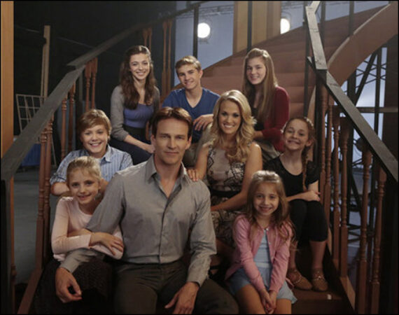 Stephen Moyer as Captain Georg Von Trapp, Carrie Underwood as Maria with (l-r) Grace Rundhaug as Marta, Joe West as Kurt, Ariane Rinehart as Liesl, Michael Nigro as Friedrich, Ella Watts-Gorman as Luisa and Peyton Ella as Gretl