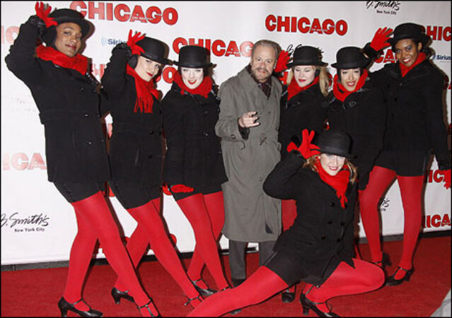 Barry Weissler (center) and <i>Chicago</i> dancers